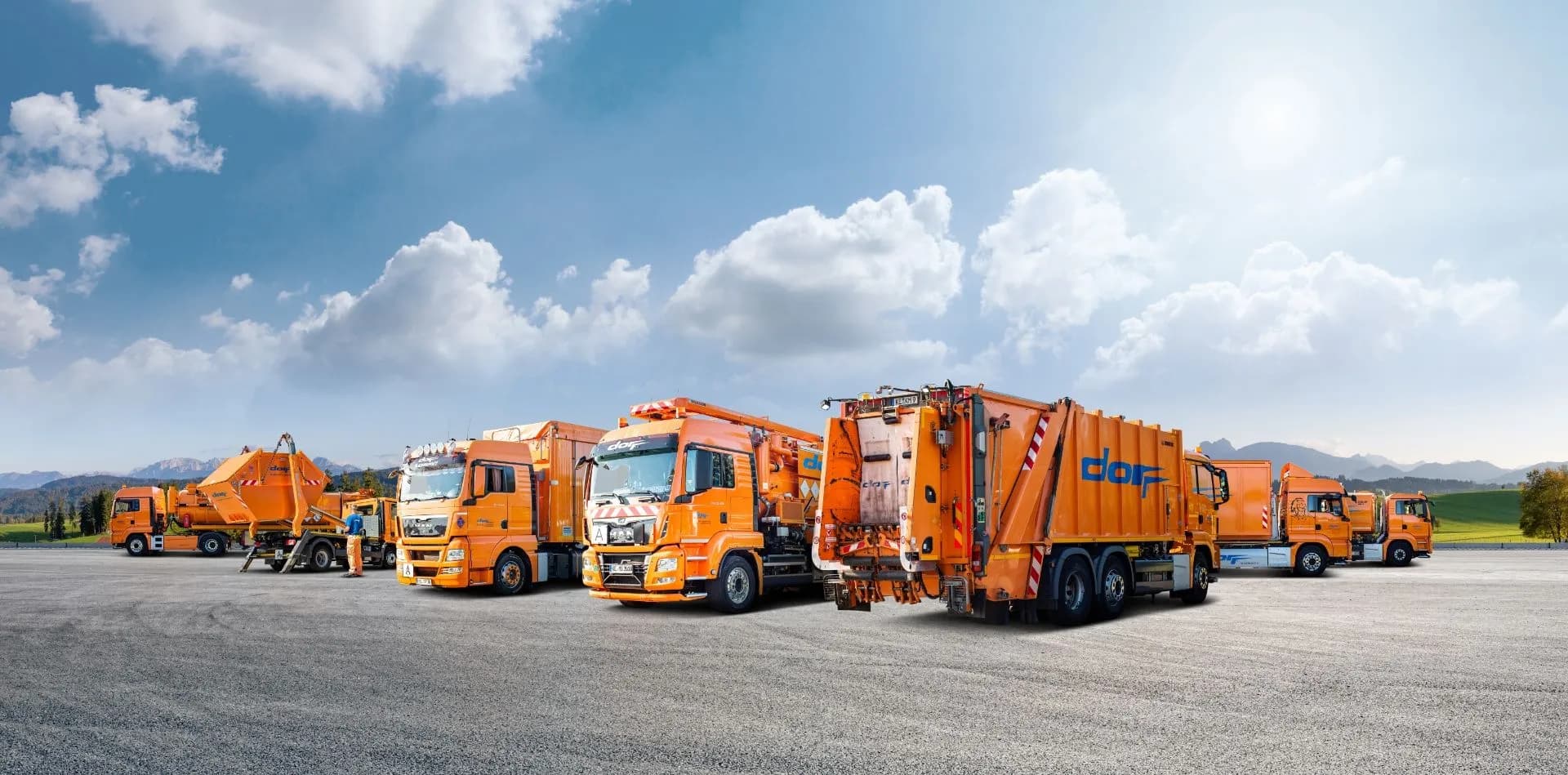 Orange waste collection vehicles from the Dorr group